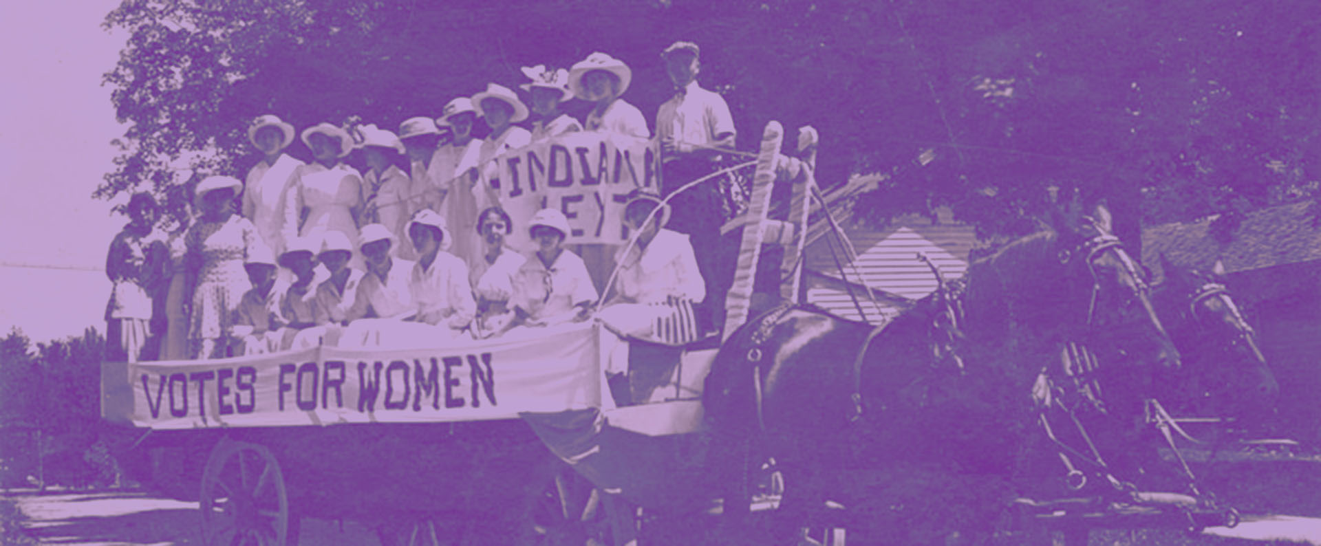 The Porter County suffragists in the horse-drawn wagon. 